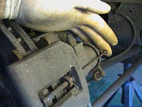 Rear brake pad retaining pin removal