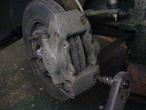 Front brake caliper removal
