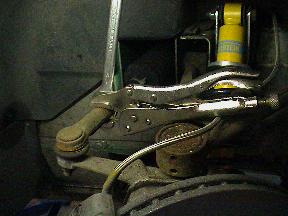 Loosening track rod end locknut(s)