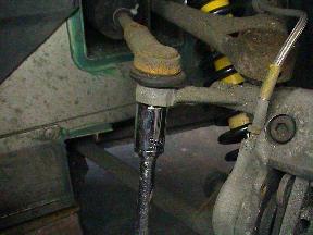 Loosening track rod end shaft nut